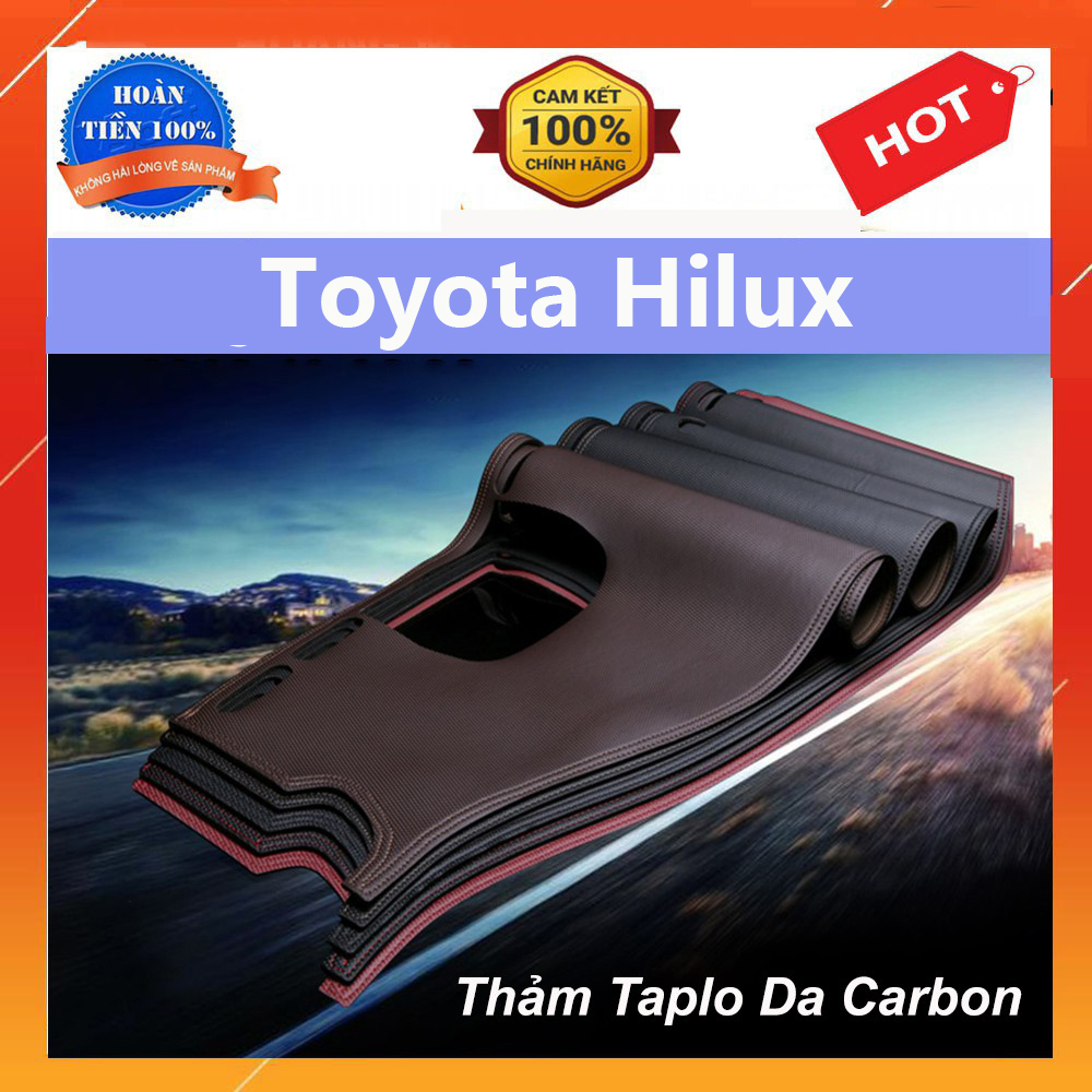Thảm Taplo Xe Toyota Hilux 2016 đến 2020 Màu Đen Mẫu Da Carbon Cao Cấp Có Đế Chống Trượt Giúp Che Nắng Taplo, Chống Nứt Bạc Màu Taplo, Chống Lóa Mắt Và Tăng Thẩm Mỹ Cho Xe