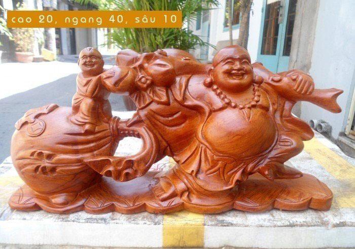 Tượng Phật Di Lặc Kéo Bao Tiền Gỗ Hương - ngang 38cm