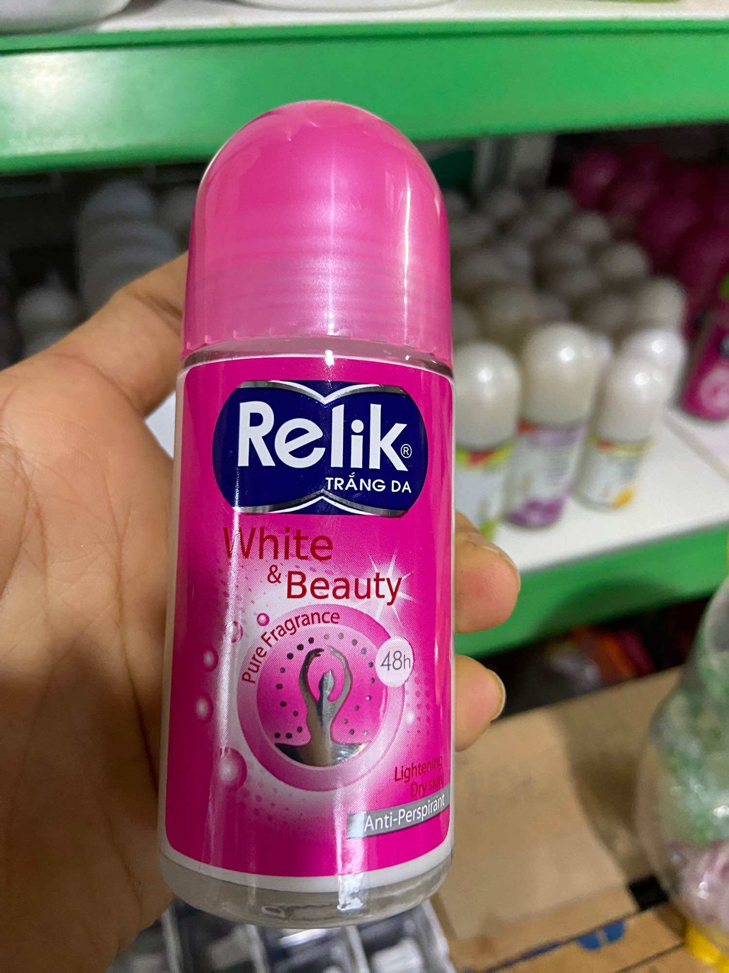 Lăn khử mùi relik trắng da 48h chai lớn 50ml