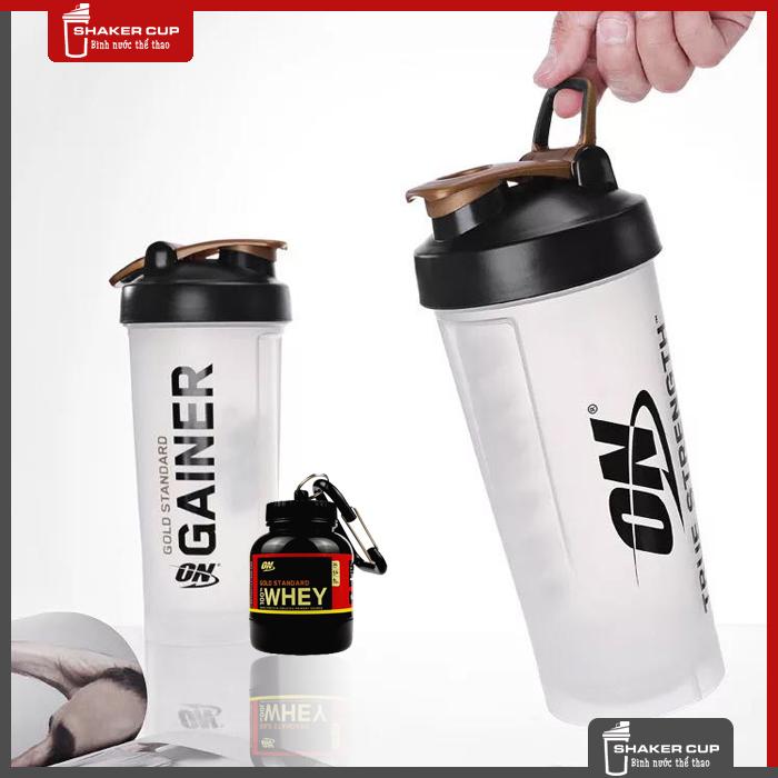 Bộ 2 sản phẩm bình nước shake bottle 1.2 Lít  và hộp đựng whey ishake protein funnel ON Gold Standard