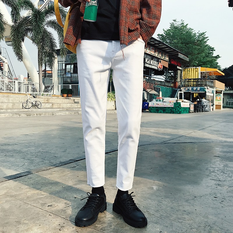 Quần jeans nam jean đen rách lai unisex ..