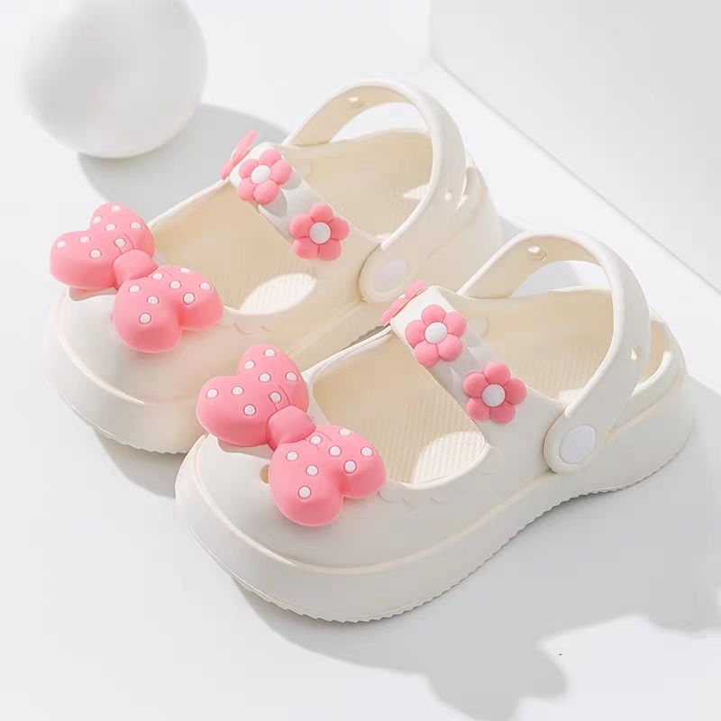 Dép sục nơ chấm bi cho bé gái siêu đẹp, nhẹ mềm- lùi 1 size