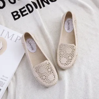 white plastic sandals