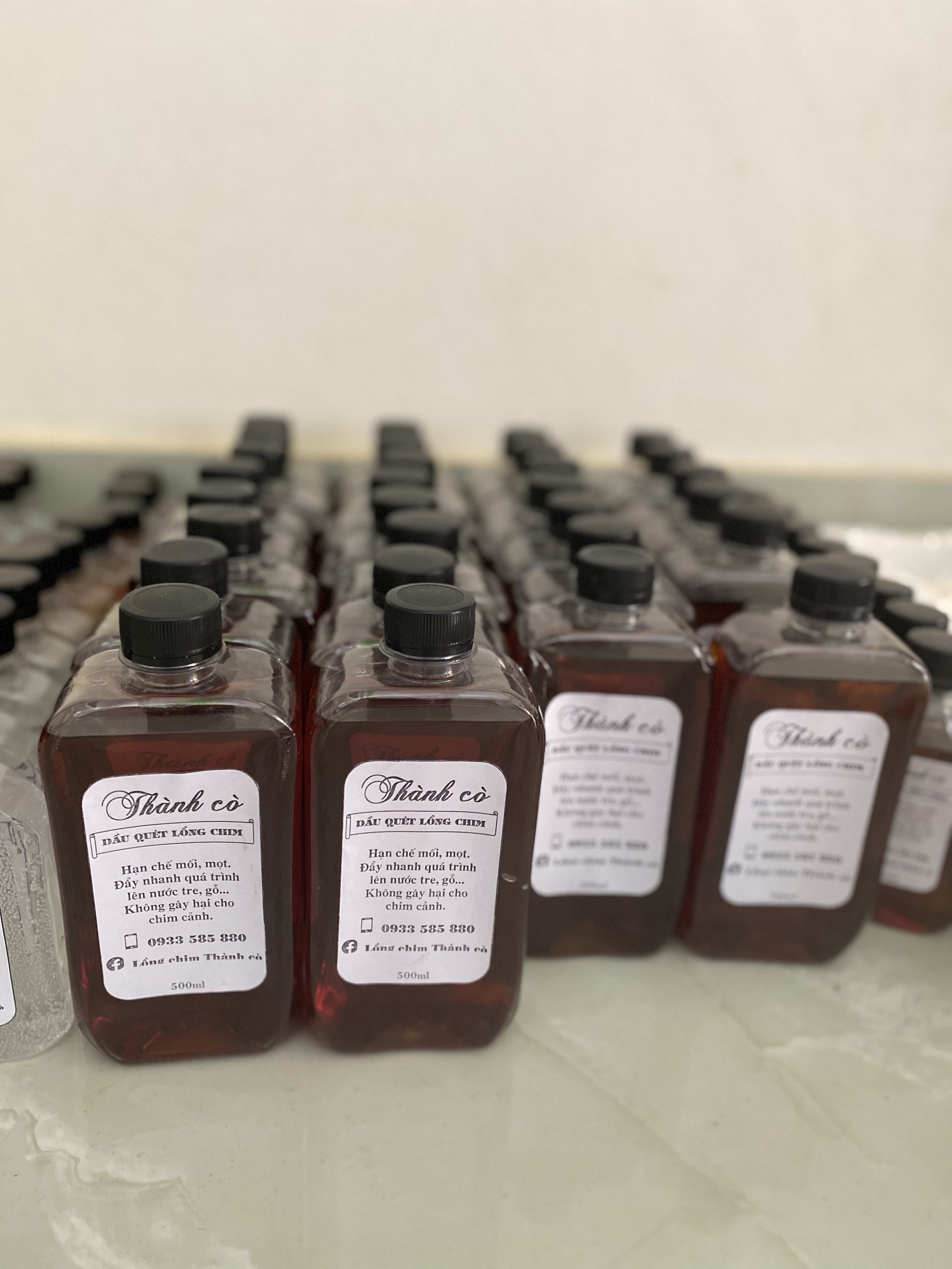 Dầu quét lồng chim Thành cò chai 500ml