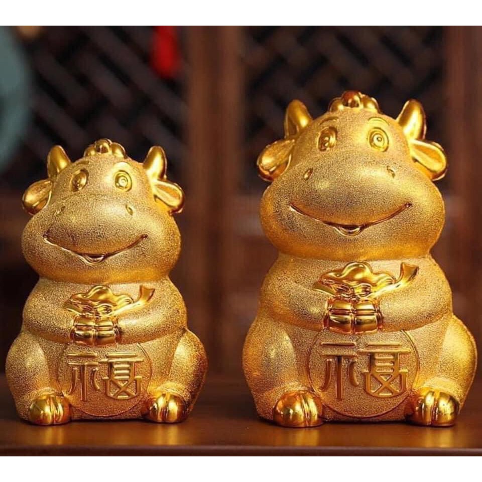 Trâu vàng đút tiền tiết kiệm