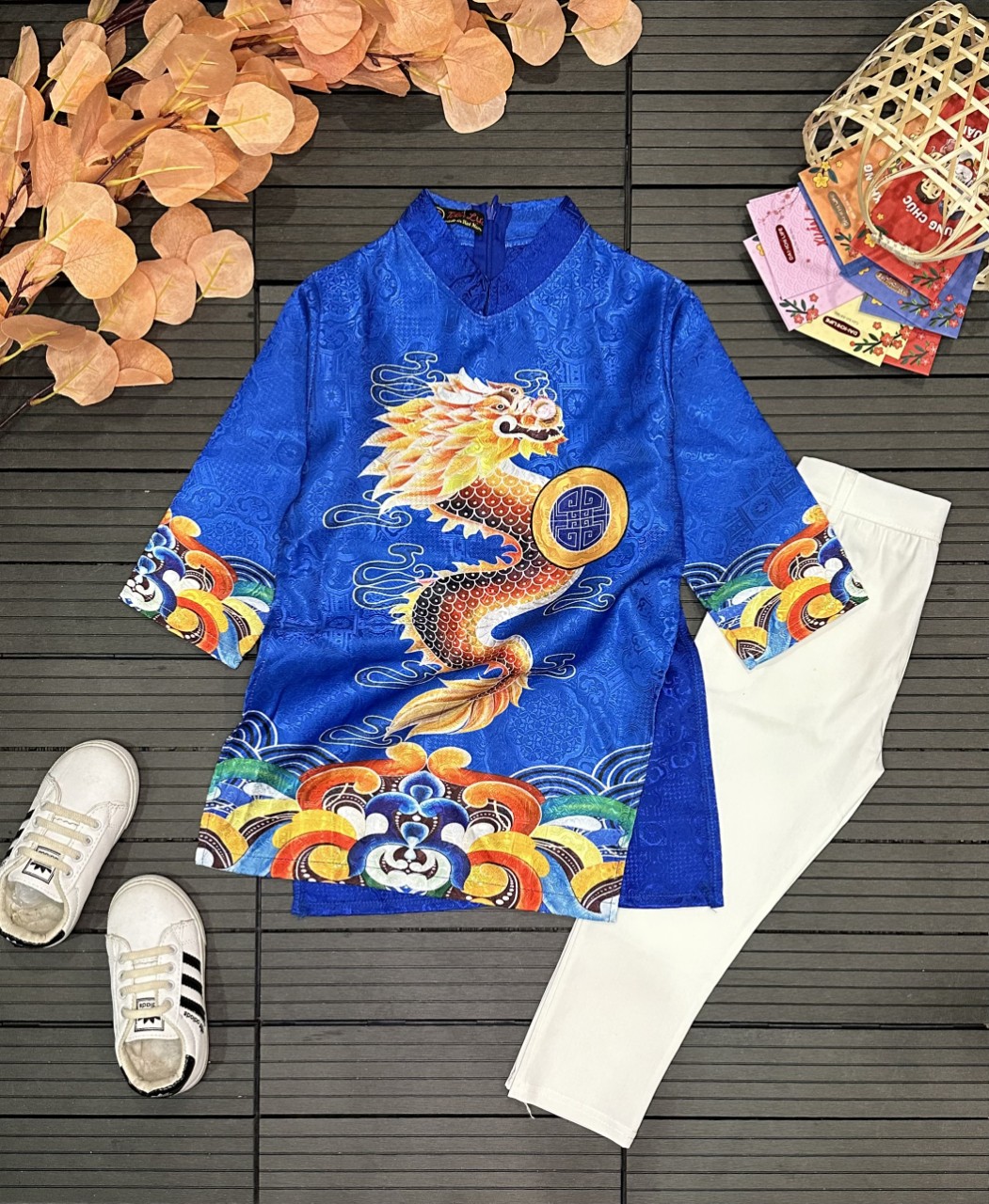 áo dài cách tân bé trai Chất liệu vải gấm.