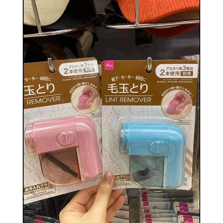 Máy cắt lông xù quần áo