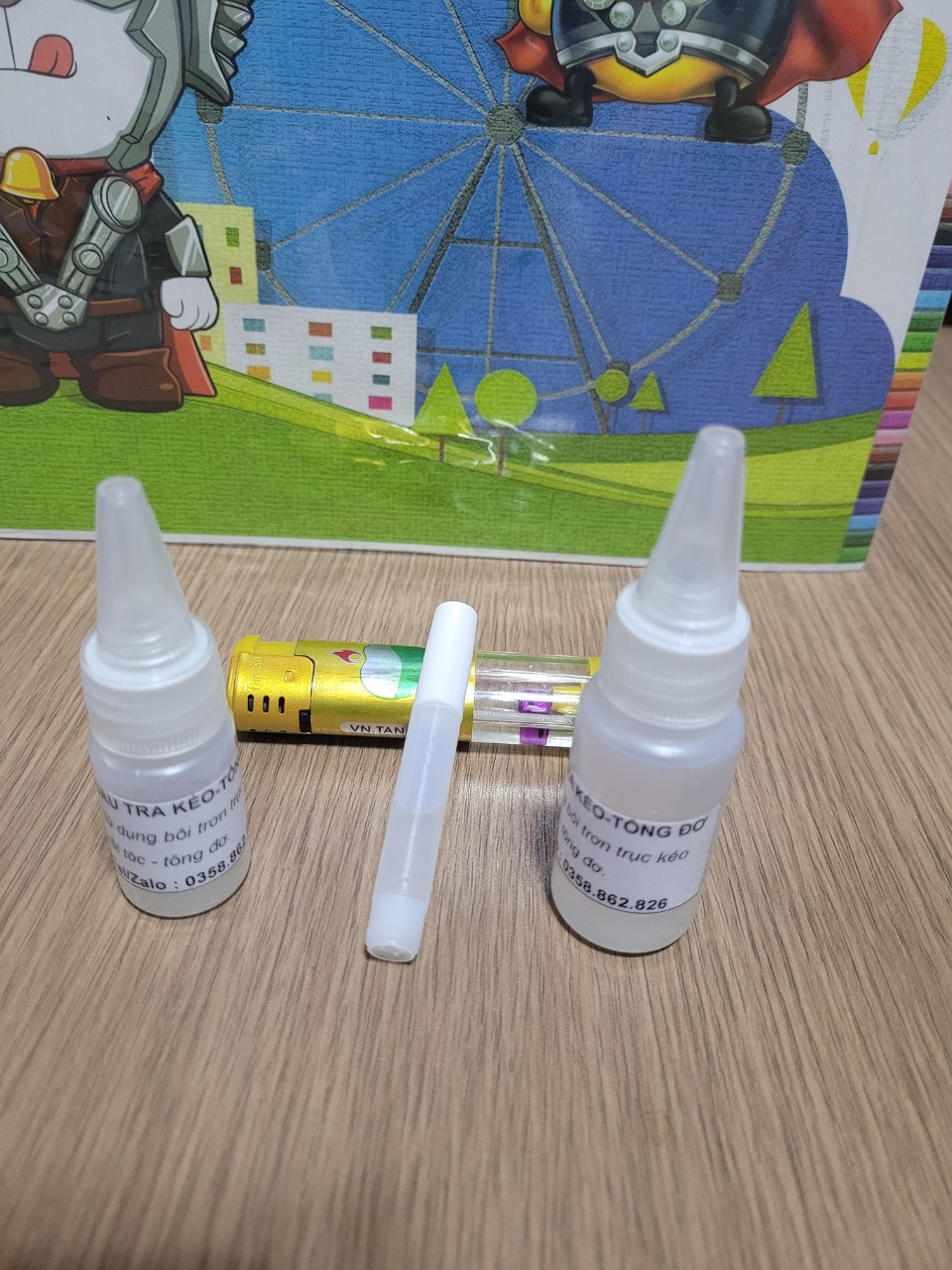 Dầu máy tra tông đơ,dầu tra kéo cắt tóc thông dụng