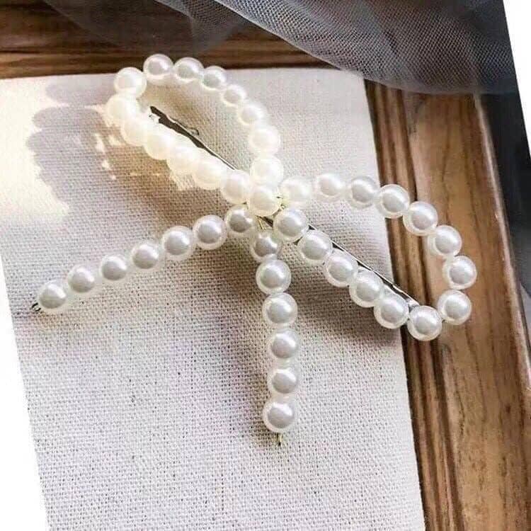 Kẹp tóc ngọc trai hình nơ