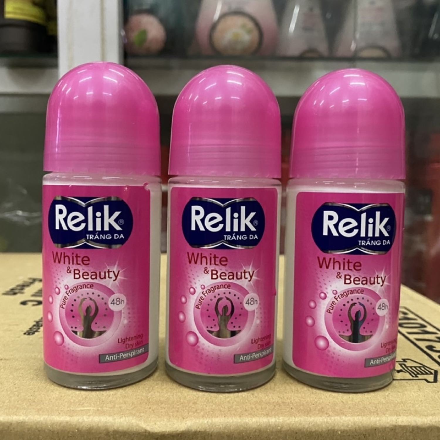 Lăn khử mùi Relik chai lớn 50ml  ( hồng )