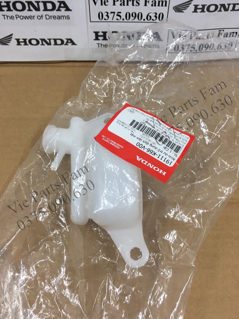 Bình nước mát phụ AB, Air Blade (giá có nắp hoặc không nắp), hàng din Honda mới 100%