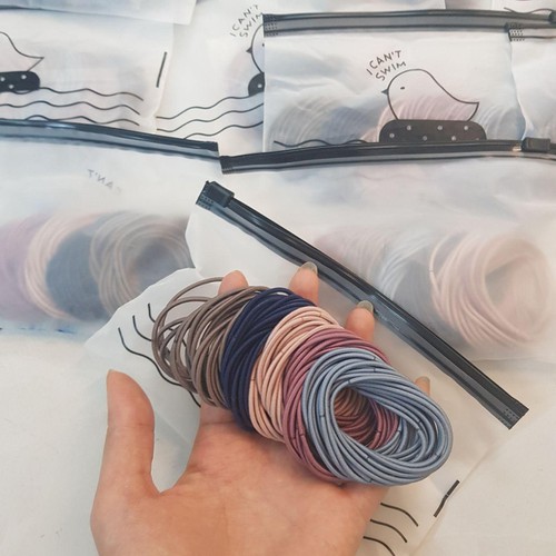 Set 100 Dây Buộc Tóc Có Túi Zip