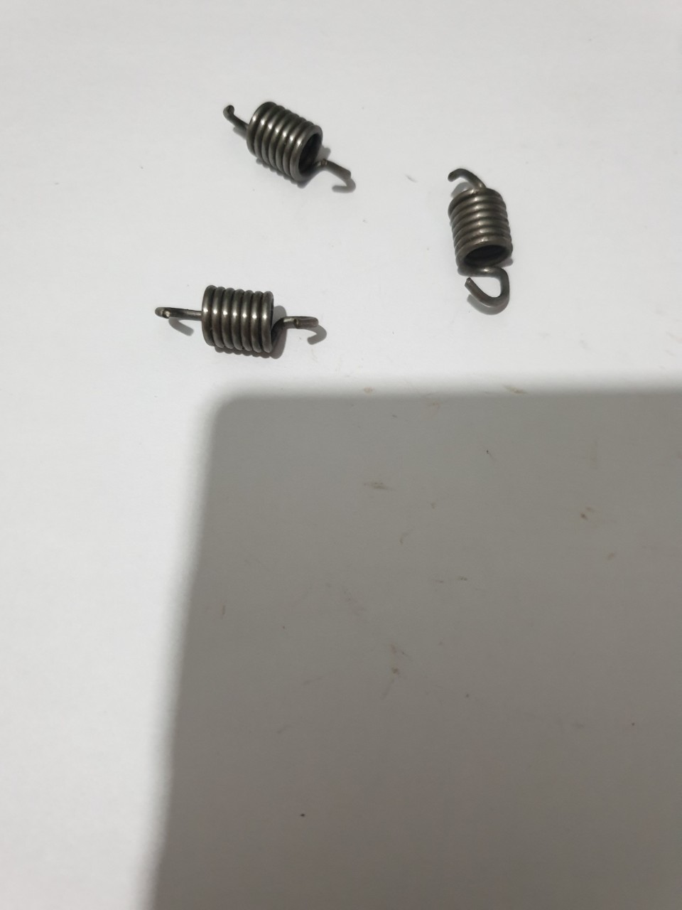 (5 CÁI) LÒ XO BỐ CÔN MÁY CƯA XÍCH MS180/250