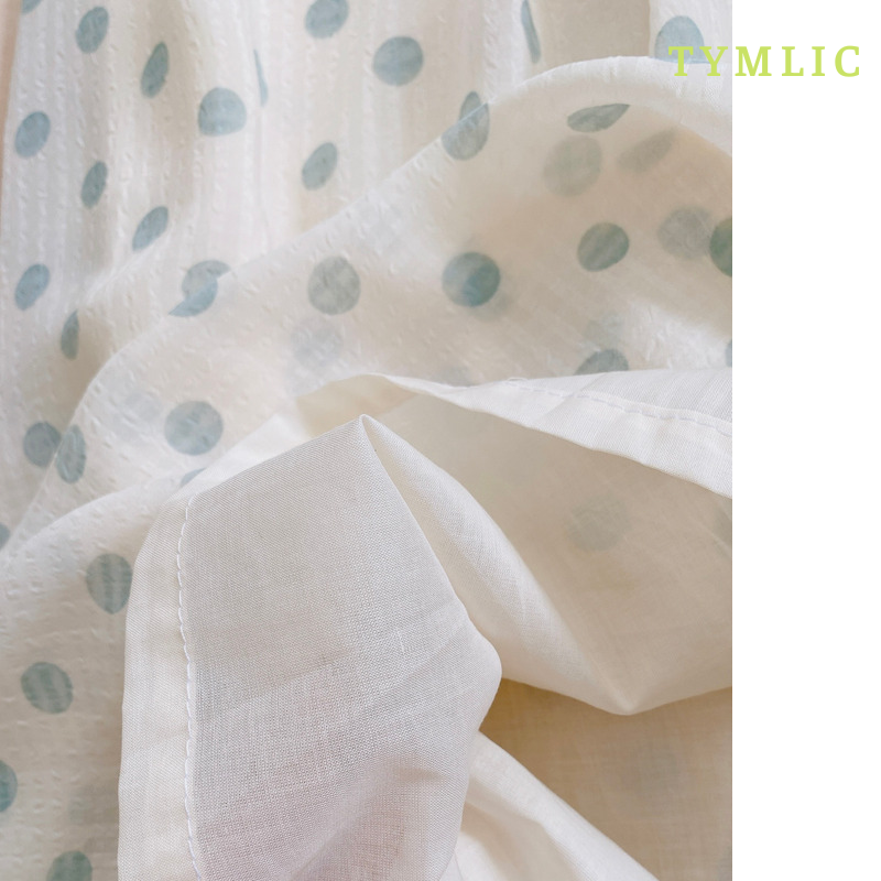 Chân váy midi họa tiết xếp ly TYMLIC