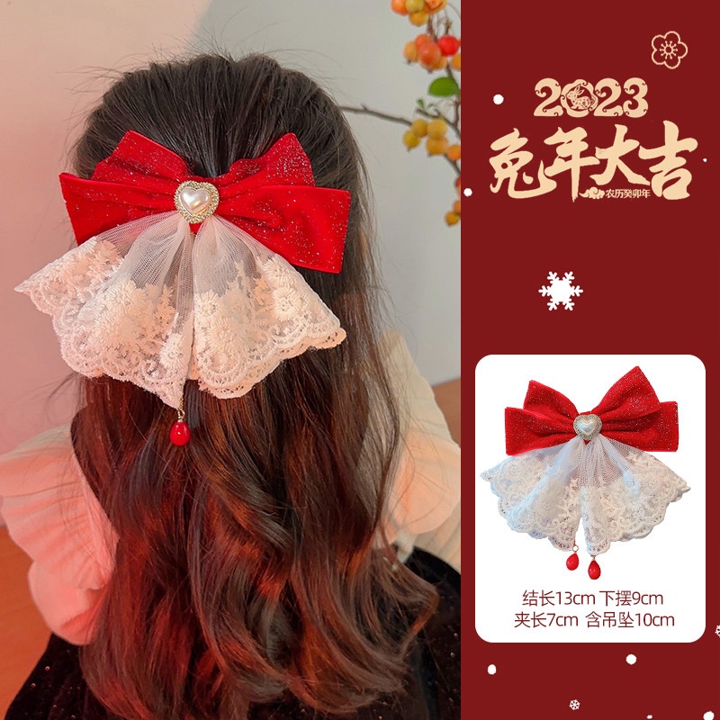 Kẹp tóc năm mới đính nơ vải nhung màu đỏ