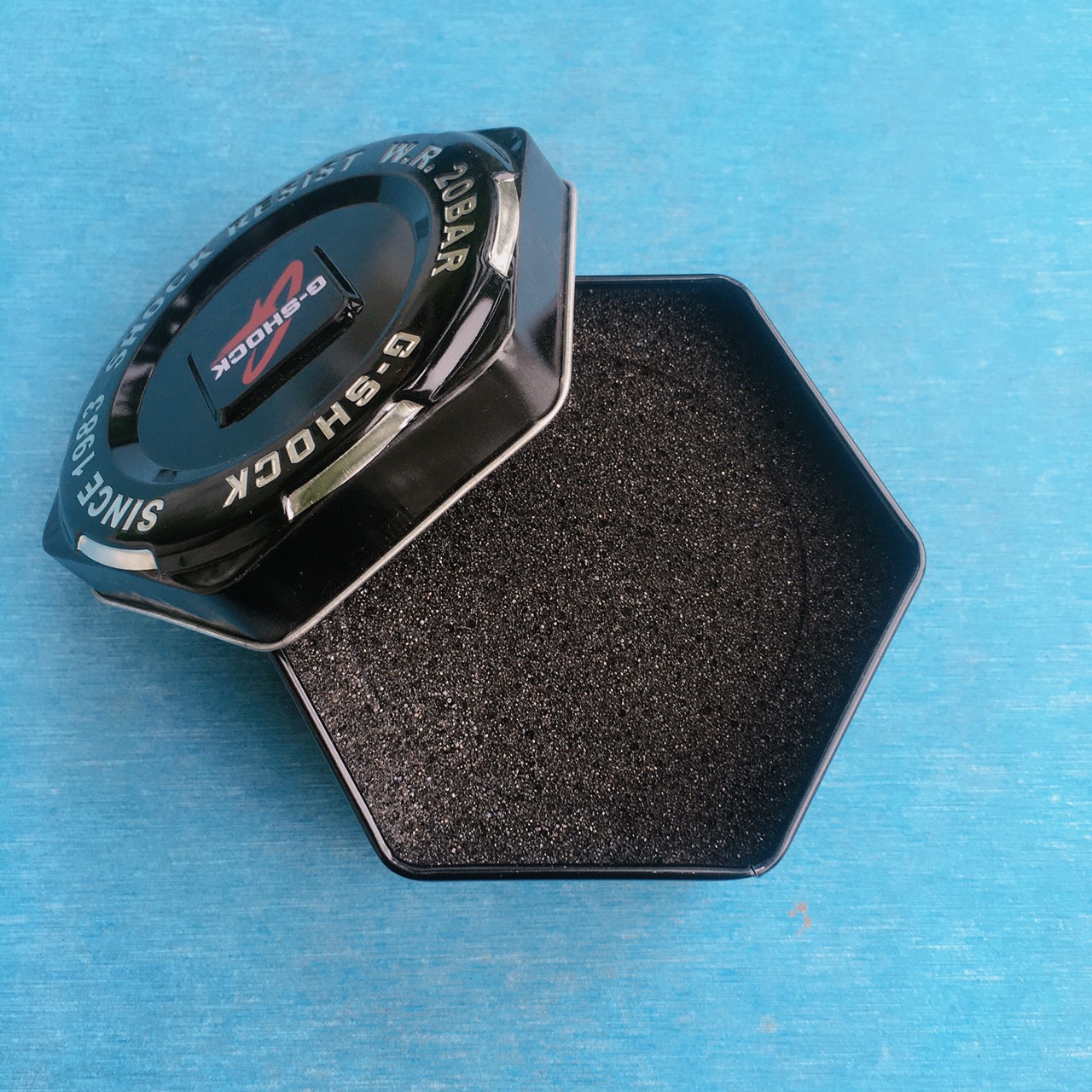 Hộp thiếc lục giác đồng hồ G-SHOCK