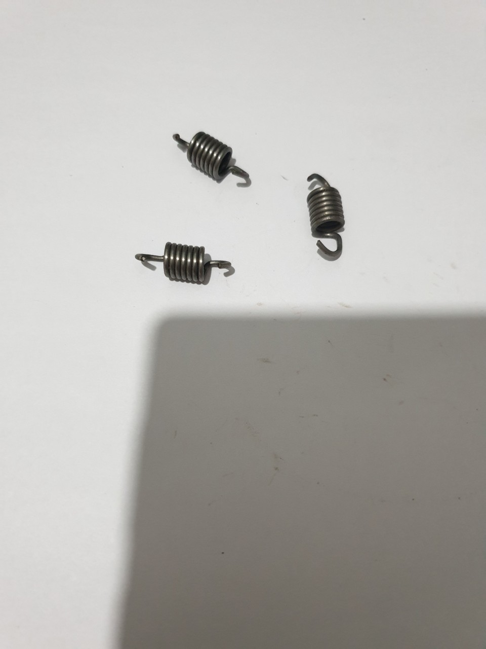 (5 CÁI) LÒ XO BỐ CÔN MÁY CƯA XÍCH MS180/250