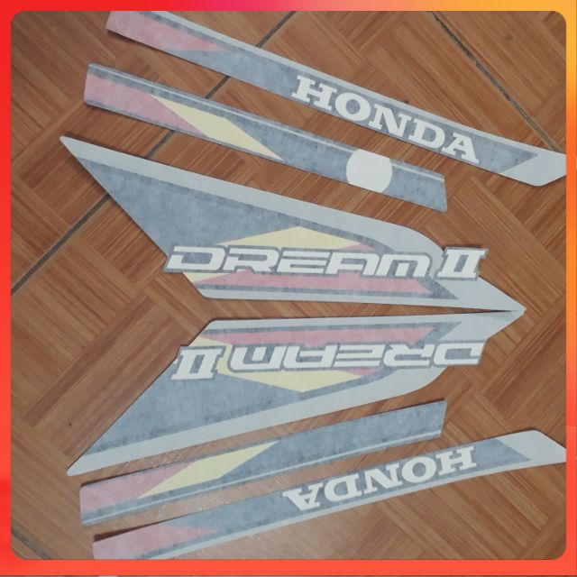 Tem xe dream thái 3 lớp zin. Tem dream thái hồng chữ to