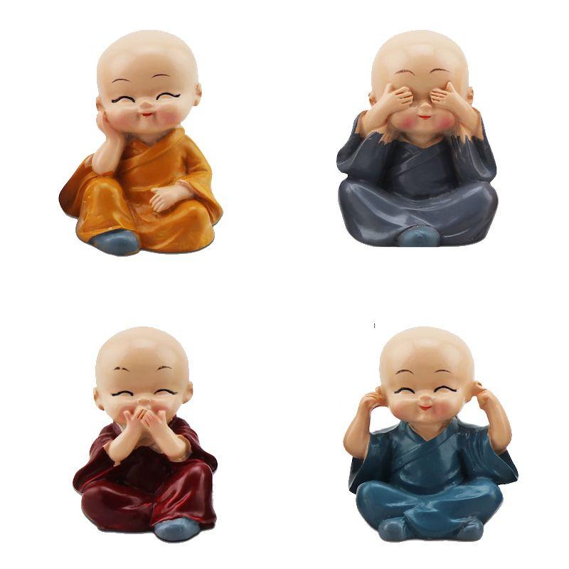 Tượng phật chú tiểu 4 không đá hổ phách
