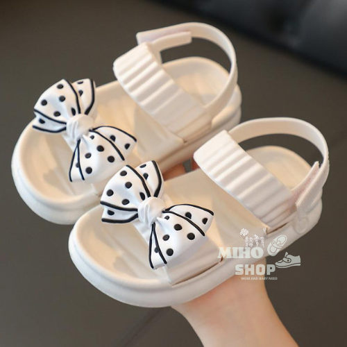 Giày sandal quai dán nơ chấm bi cực mềm mại êm chân cho bé