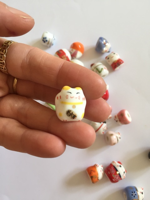 Mèo gốm thần tài đủ màu