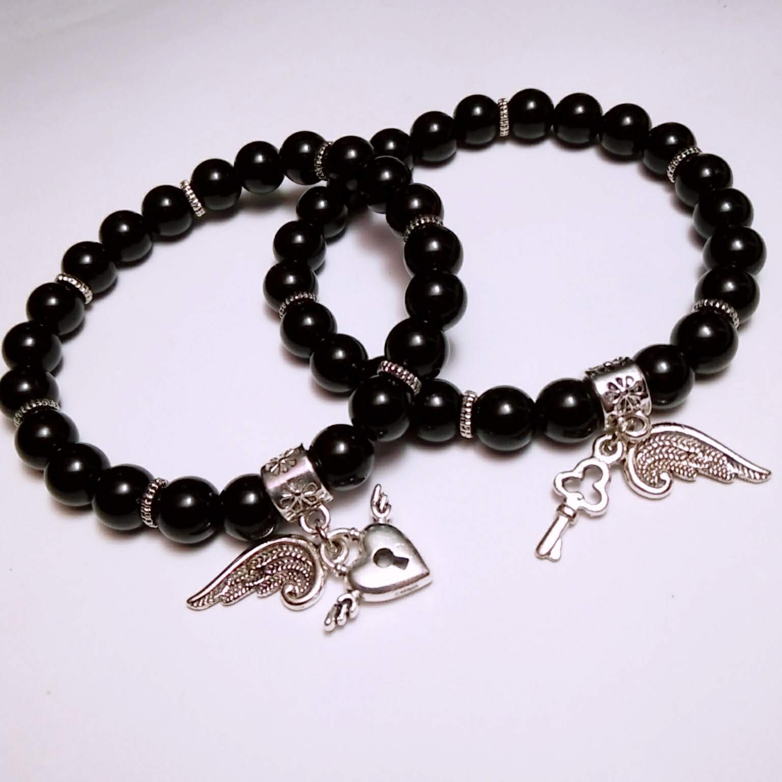 Vòng tay cặp đôi chuỗi hạt charm đôi cánh (2 vòng)