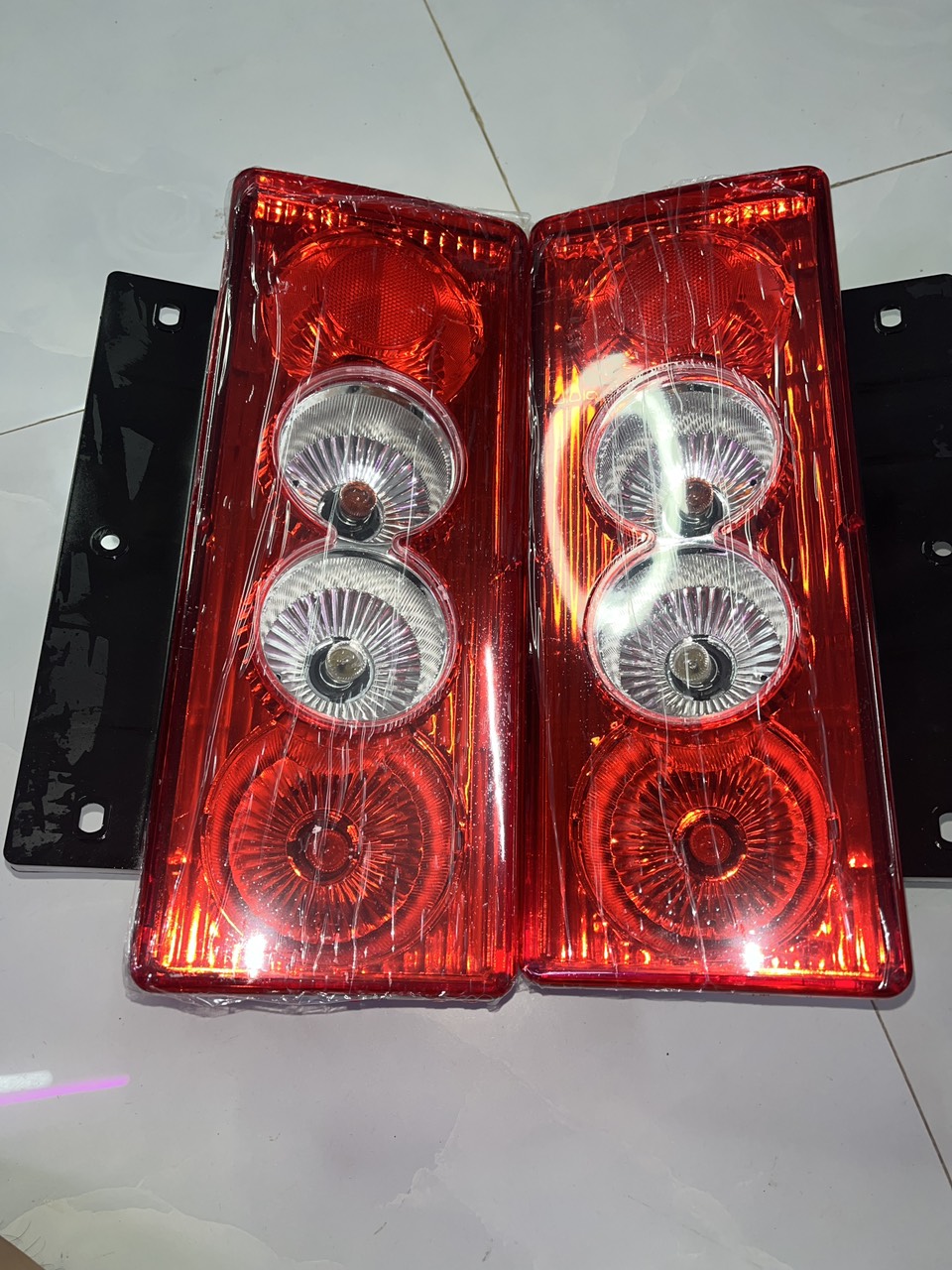1 đôi đèn hậu lắp cho xe ô lin