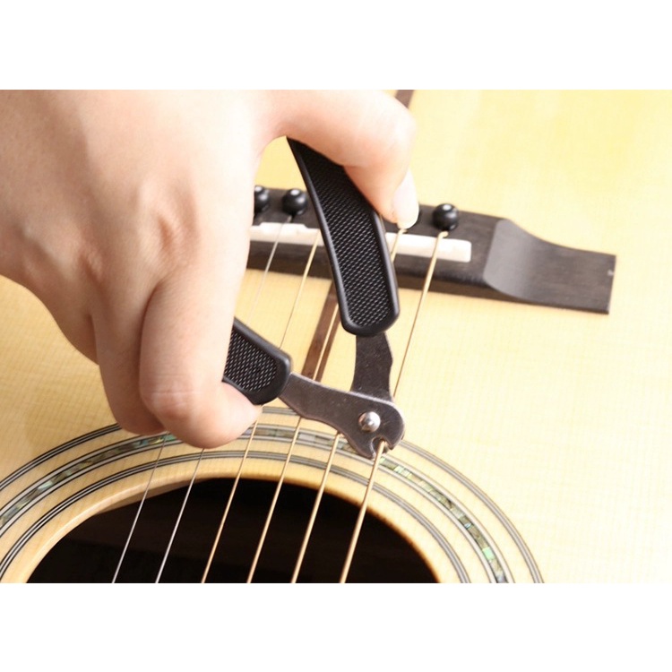 Dụng cụ thay dây đàn guitar đa năng