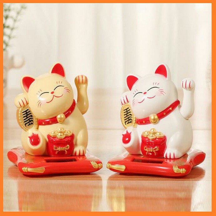 Tượng mèo thần tài vẩy tay may mắn