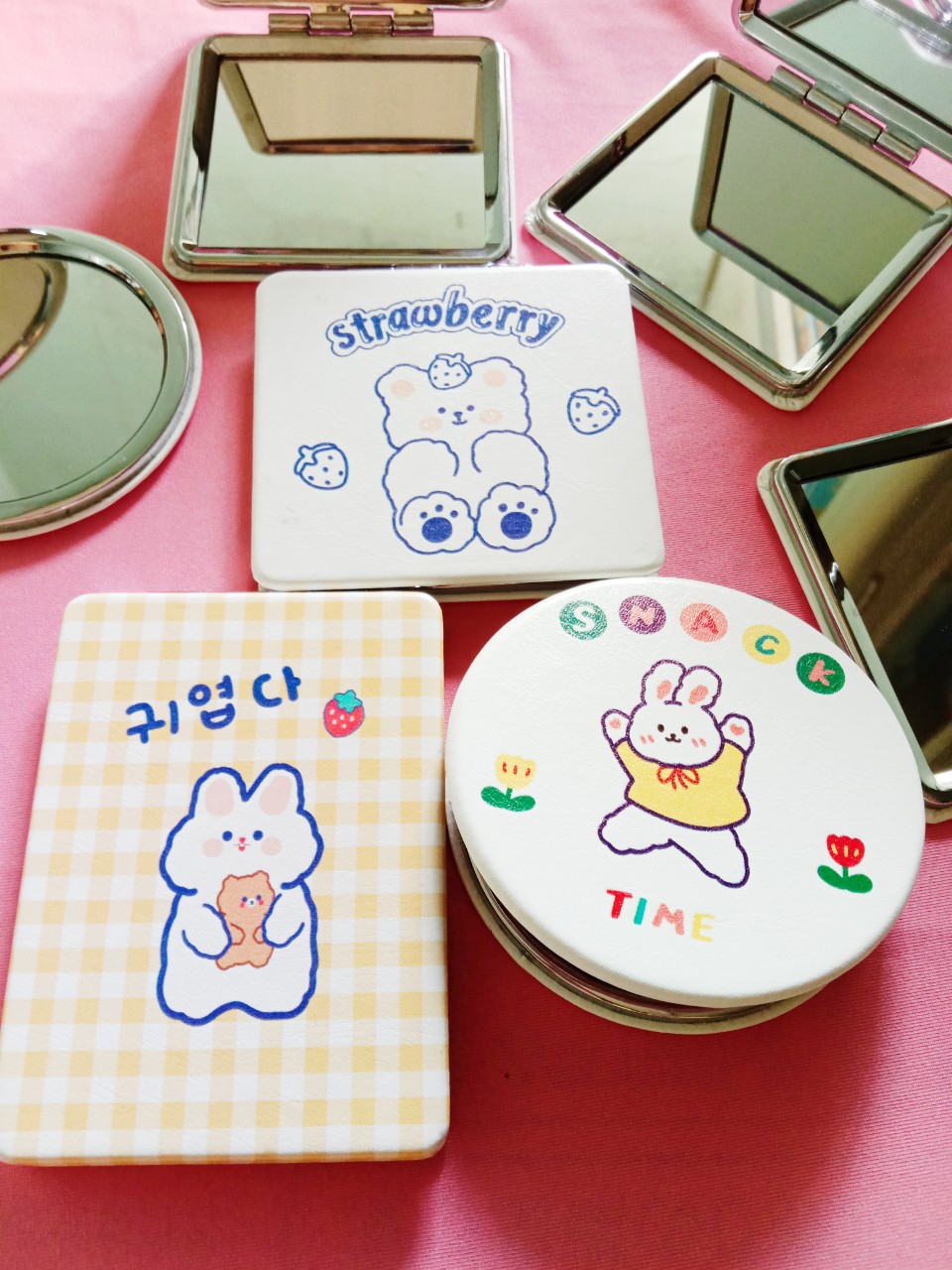 Gương 2 mặt mini cầm tay