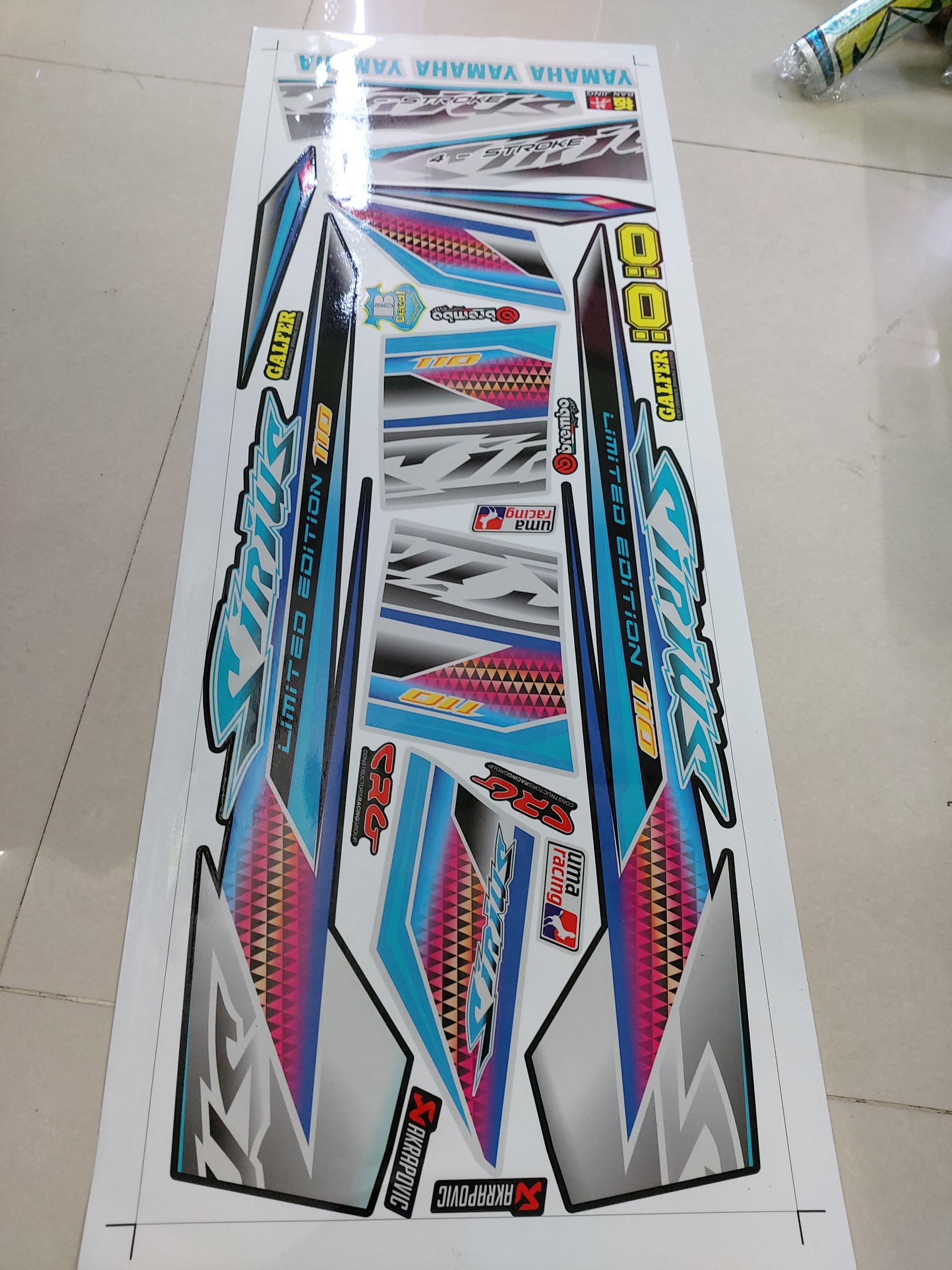 Tem sirius xăng cơ tam giác dán xe bạc đen