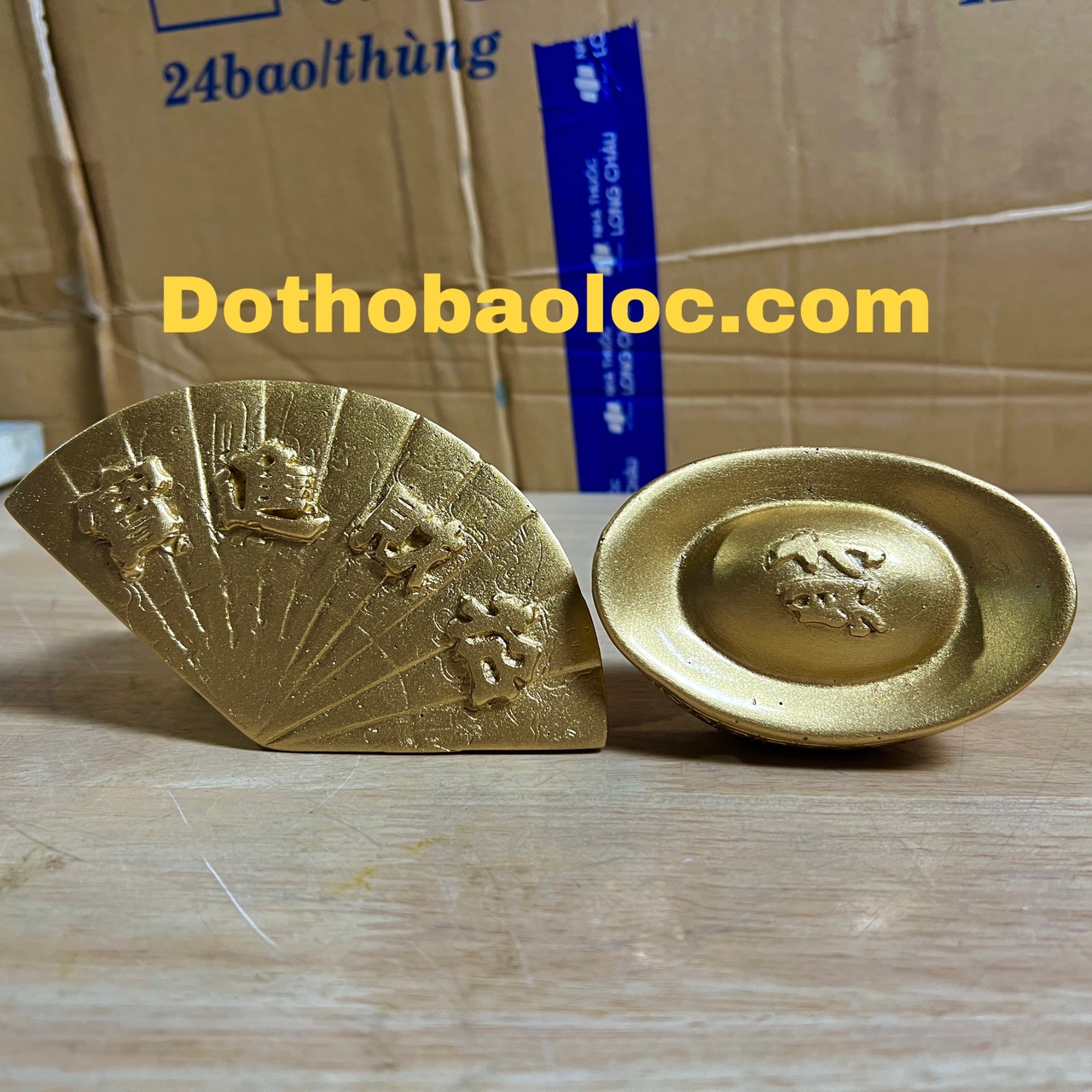 Thỏi vàng, quạt tượng di lặc bằng bột đá