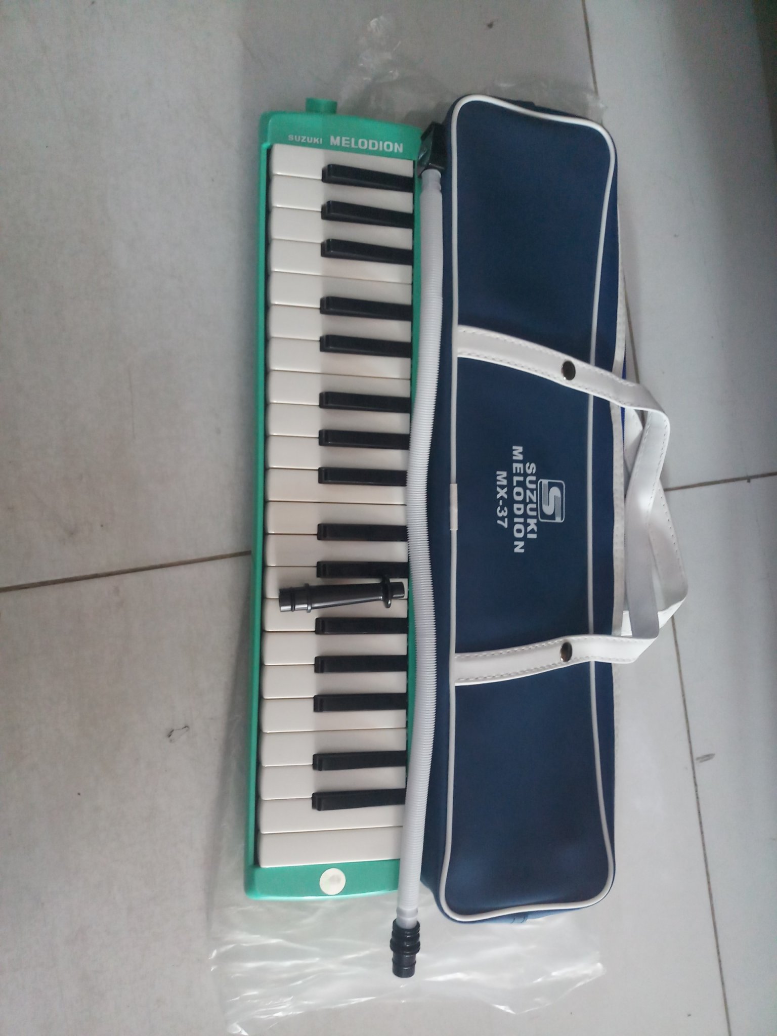 Combo Kèn Melodion Suzuki 37 Phím và kèn Hamonica