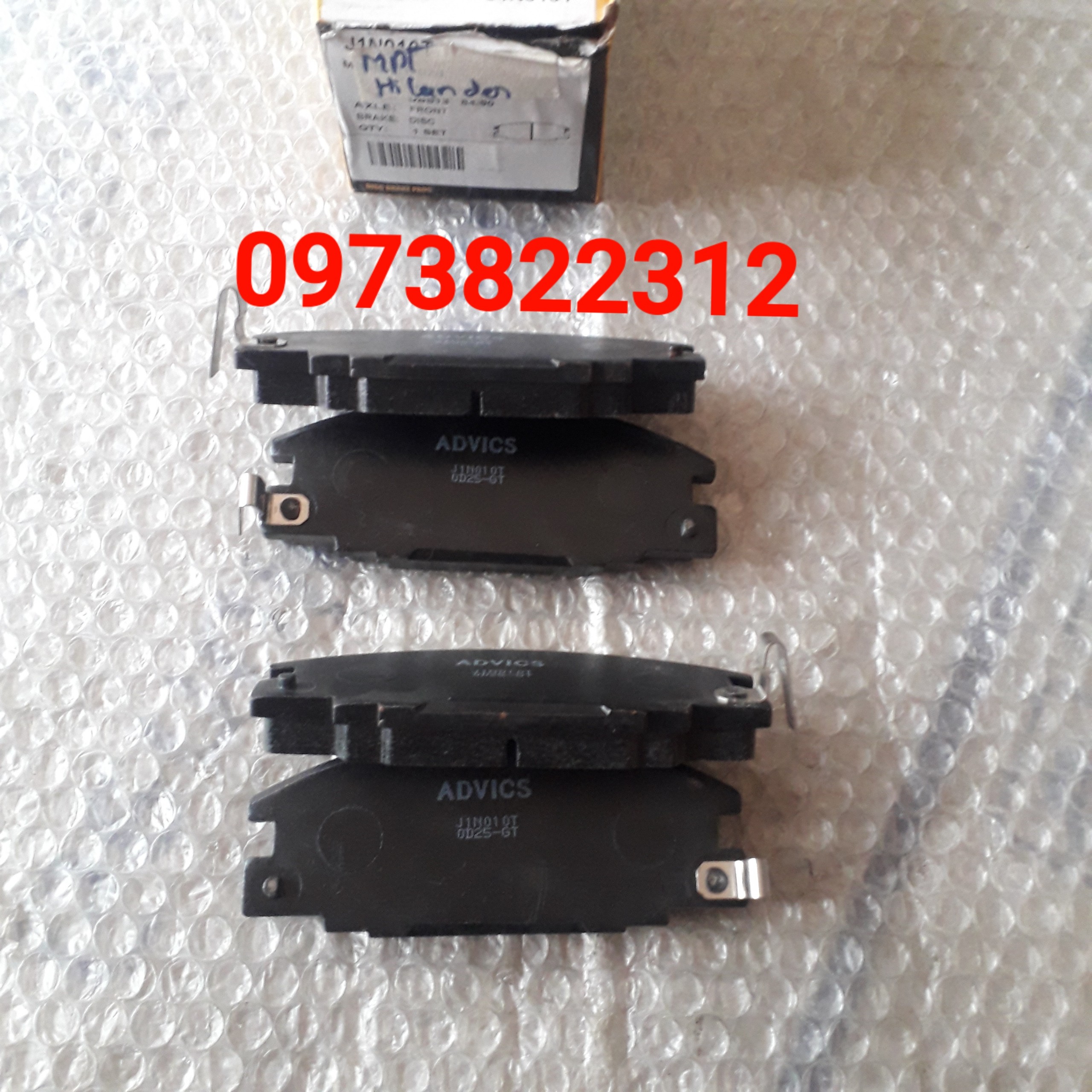 Má phanh trước isuzu hilander advics japan