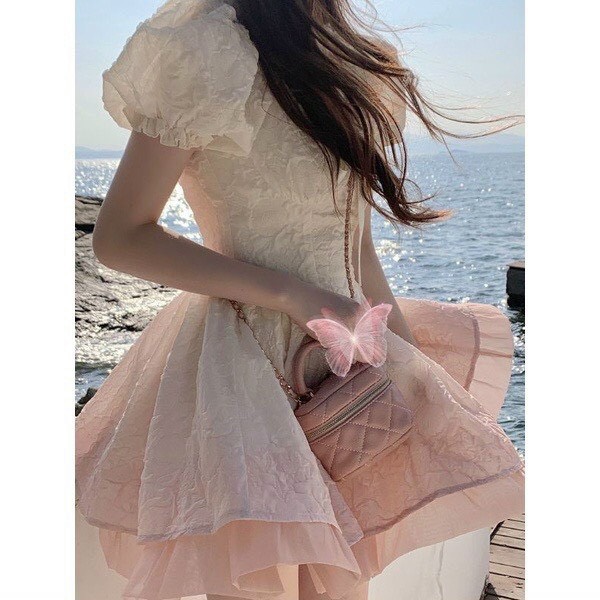 HOÀN TIỀN MAX - Đầm thời trang nữ mặc đi chơi chất gấm xốp phối loang hồng cột nơ voan cổ vuông tay búp váy xoè ngắn