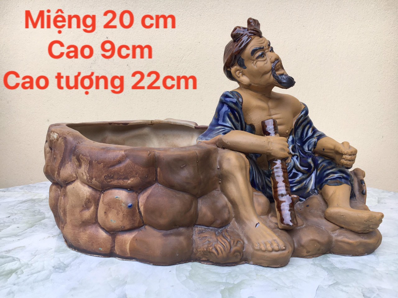 Chậu tượng ông lão nông