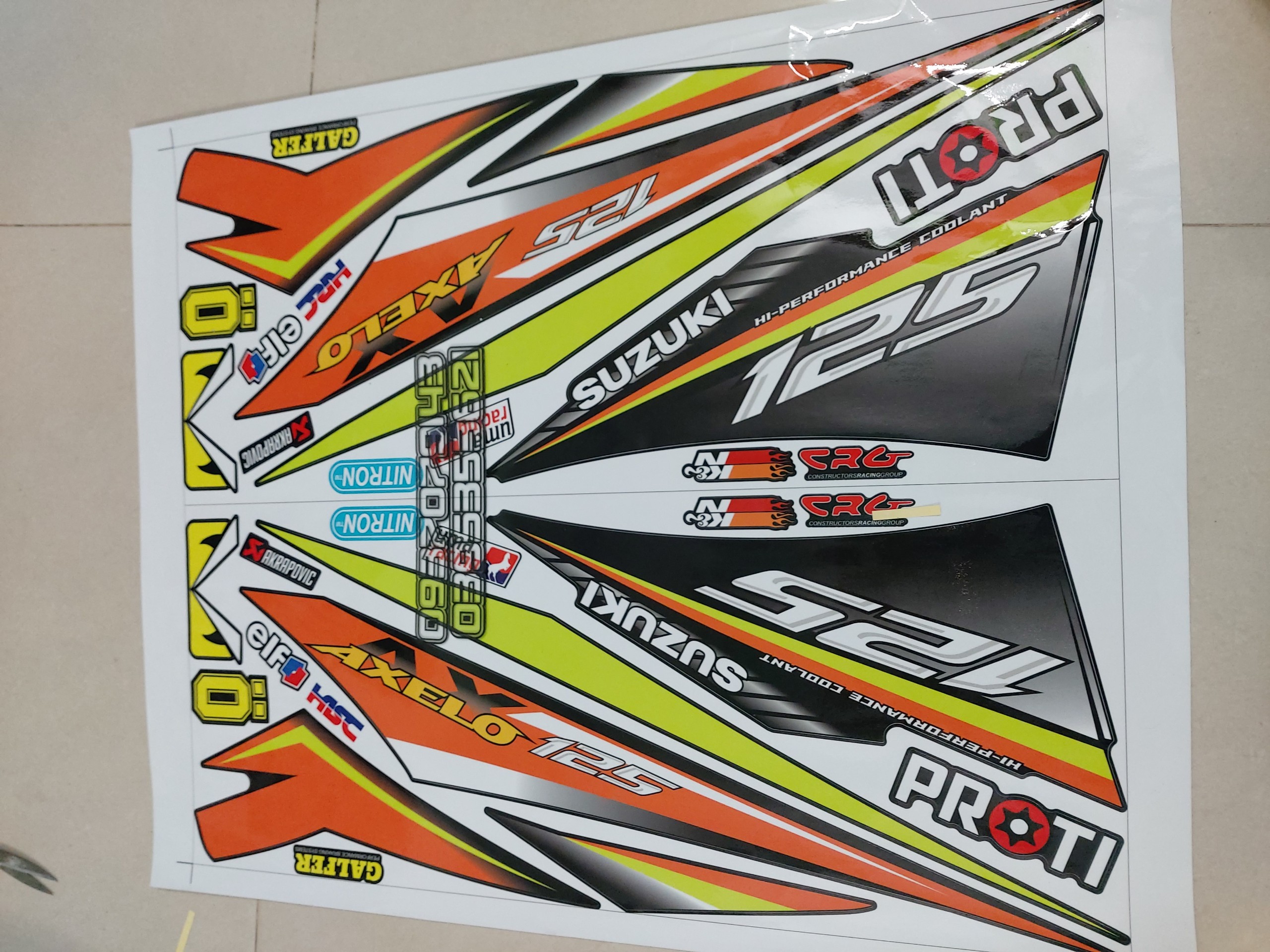 [HCM]Tem axelo suzuki 125 cam xanh dán xe đen