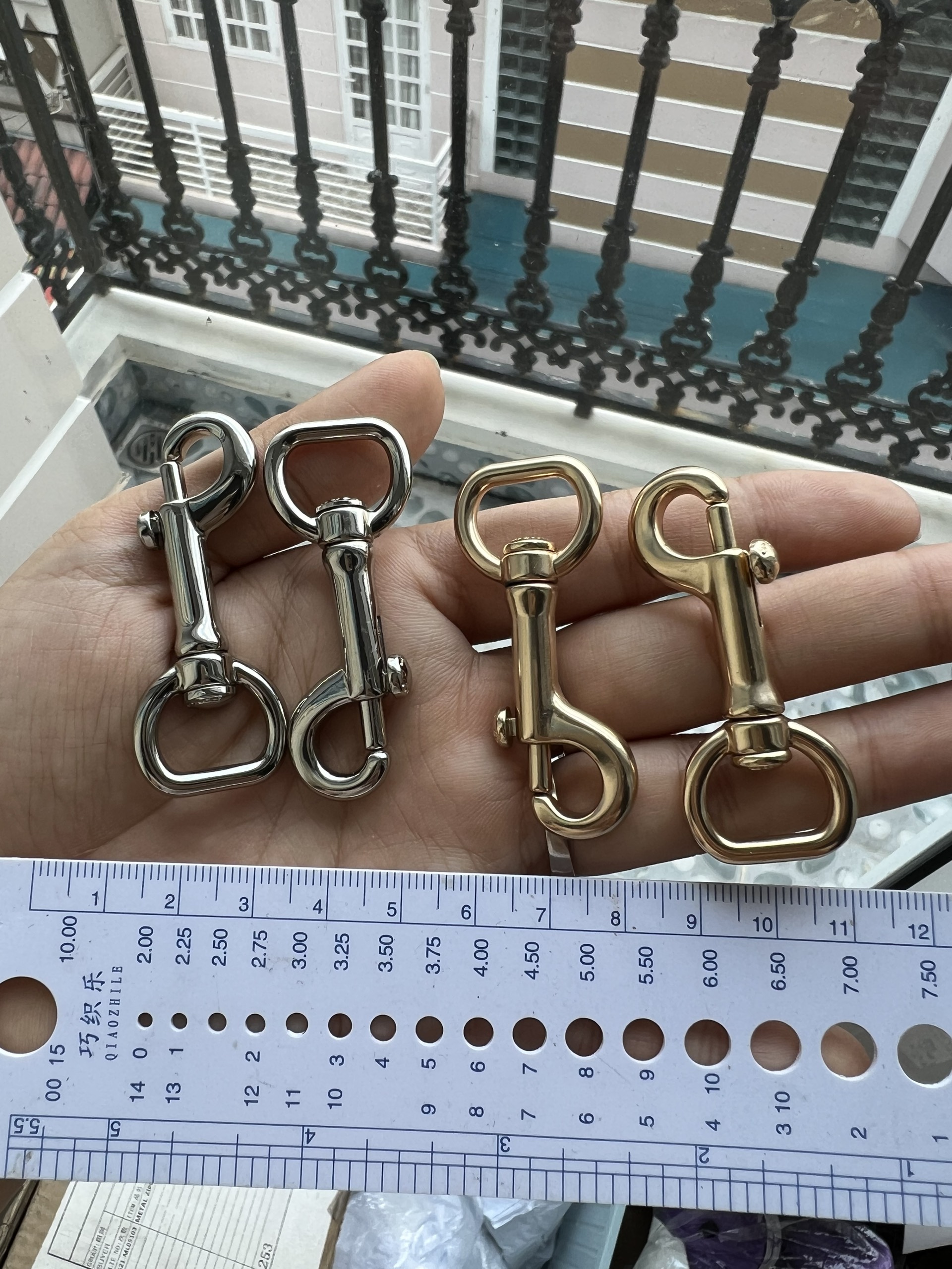 Crab Claws with the Letter C Stamped on Them 20K/Pair Attached to Handbags