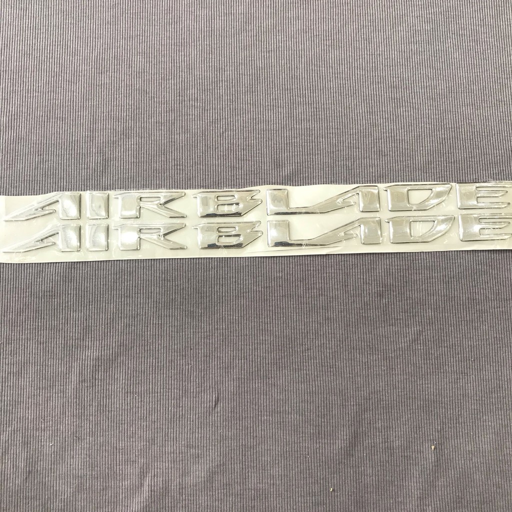 Tem nhựa dẻo logo cặp chữ Airblade giống như zin màu bạc