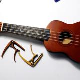 Capo kẹp đàn guitar vân gỗ vàng sáng