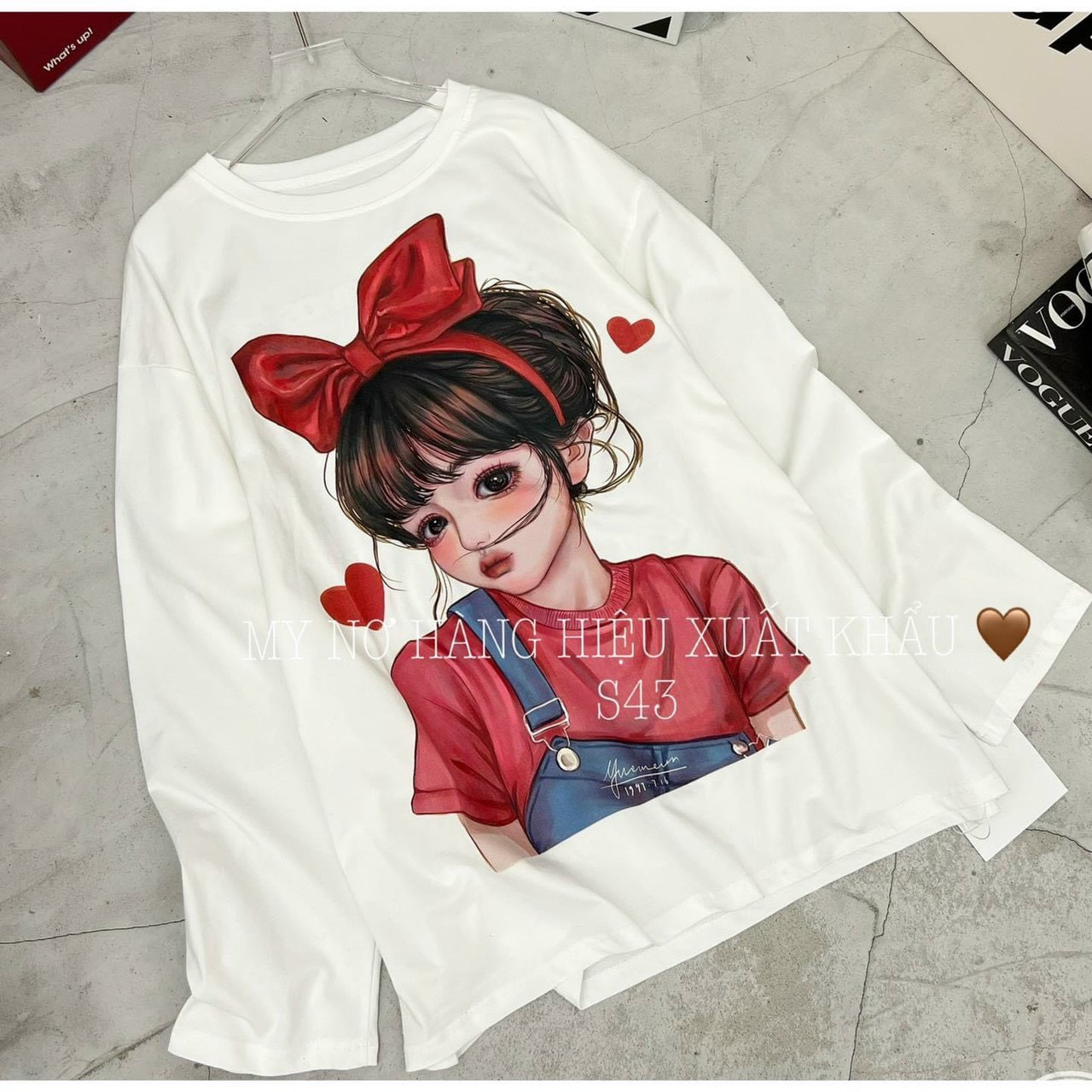 Áo thun giấy xnk form rộng cô gái