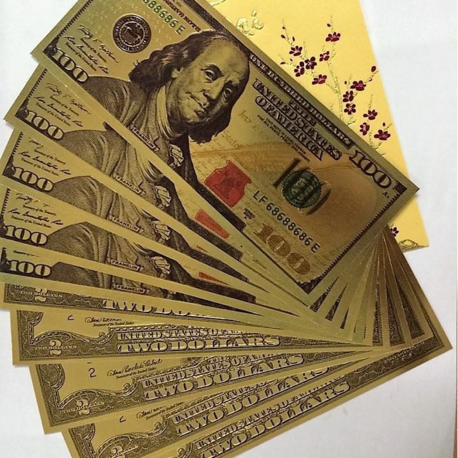 {SALE KHỦNG} tơ` 2USD Mạ Vàng Plastic làm quà lưu niệm {siêu rẻ}