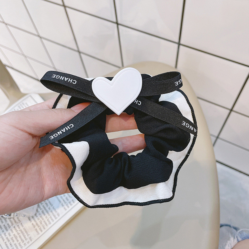 Dây Cột Tóc Nơ Đen Trắng Hình Trái Tim Dễ Thương