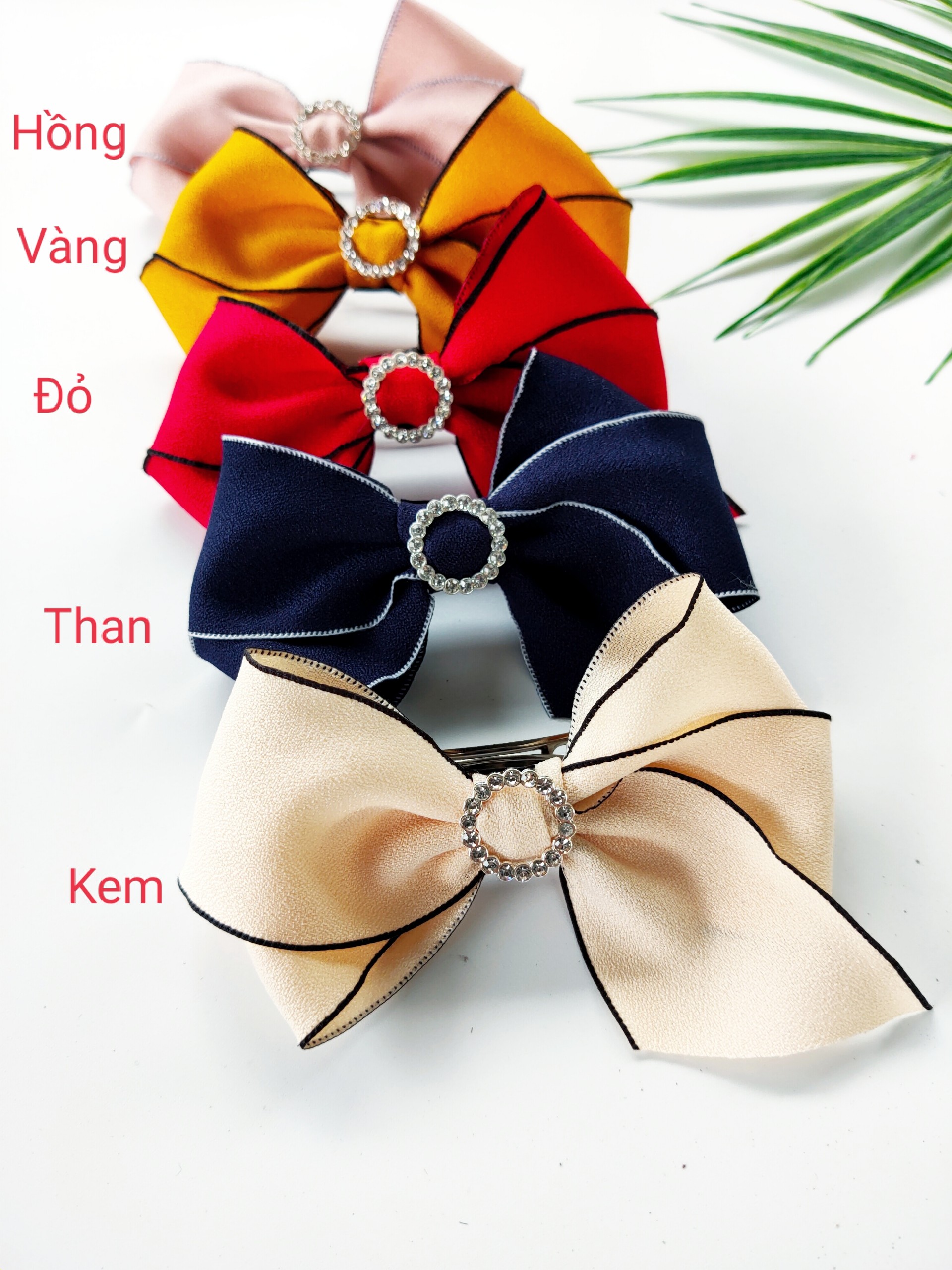 B416 Cặp tóc nơ đuôi đính đá