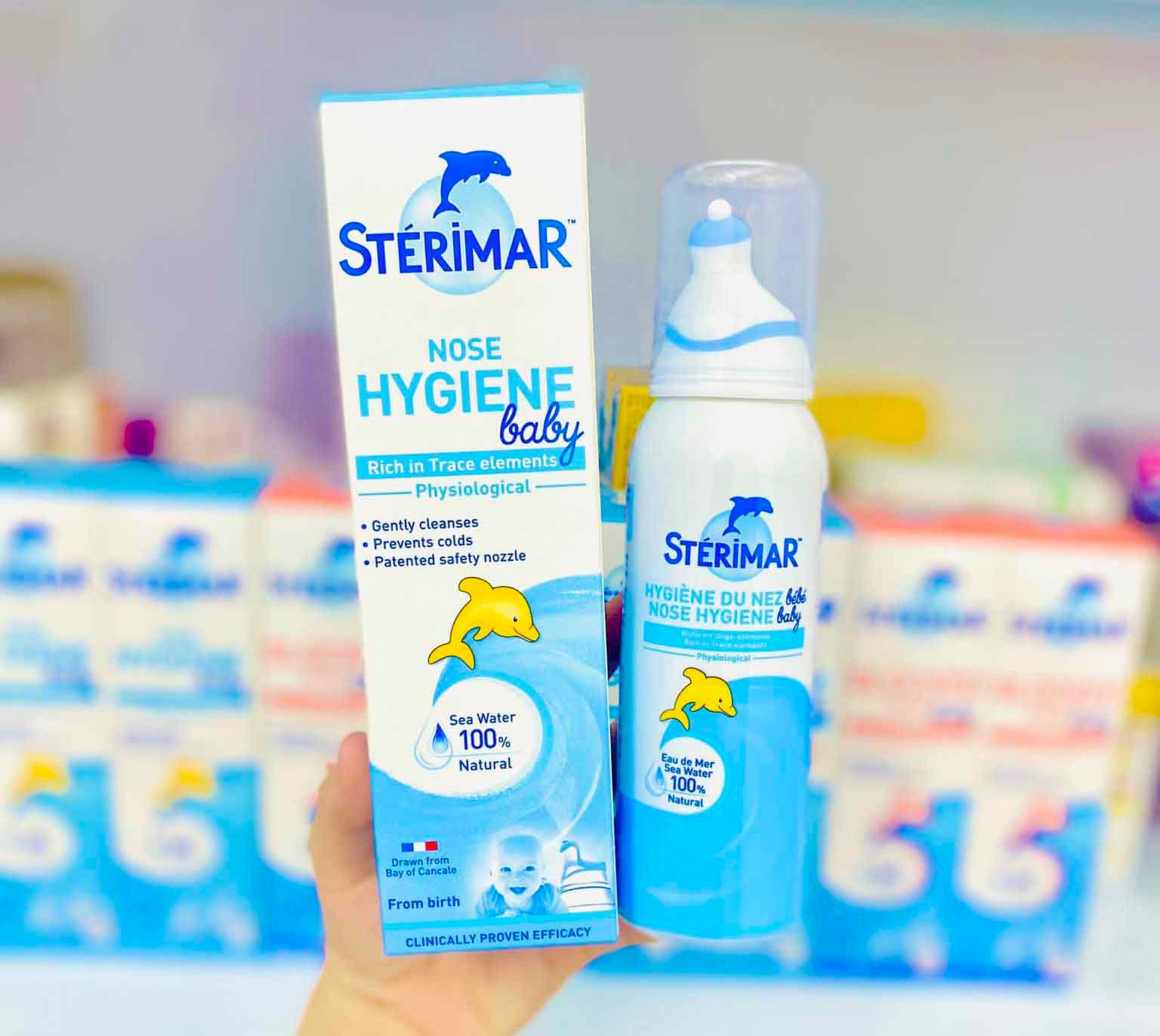 Xịt muối biển cá heo Sterimar màu cam 100ml của Pháp