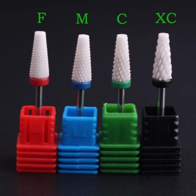 Đầu mài sứ dạng trụ vát.Giúp phá bột , phá đắp gel phá sơn