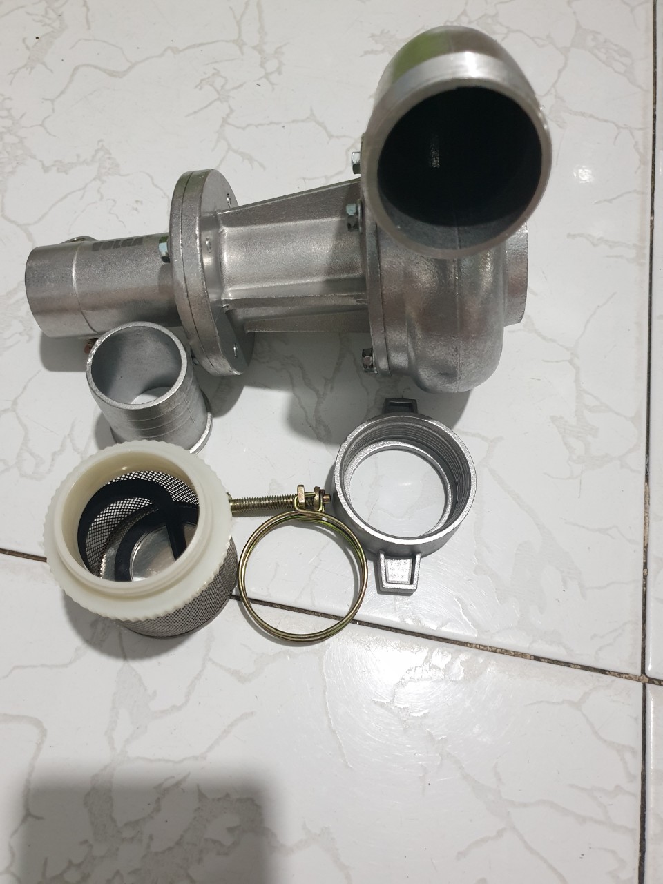 Đầu bơm nước phi 28mm, 9 khía  gắn máy cắt (phát) cỏ.