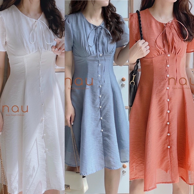 Đầm phối nút ngọc dáng xoè nhẹ cột nơ cổ