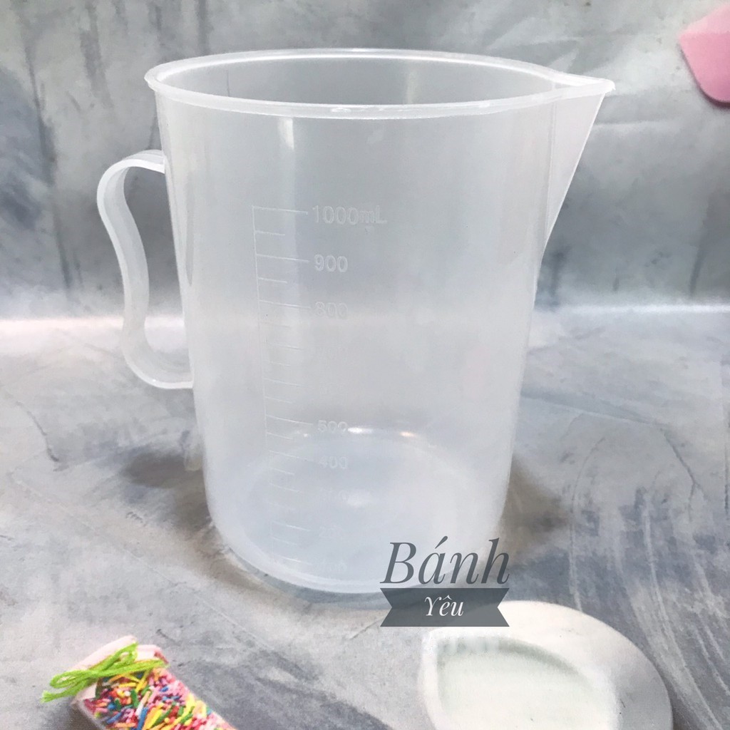 Ca nhựa đong lường nước