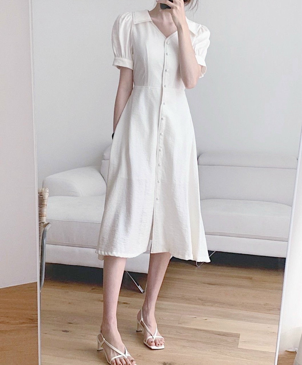 Đầm sơ mi trắng viền chỉ đen